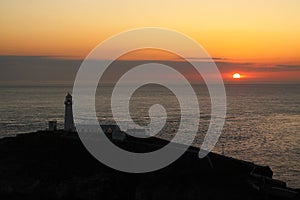Lighthouse sunset summer solstice B