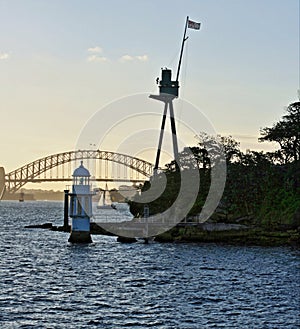 Lighthouse in Sydney Harbor near The Coathanger bridge