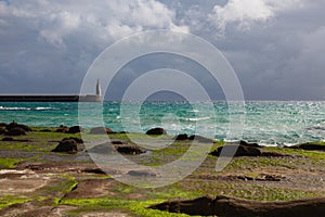 Lighthouse in Tarifa and dramatic sky, Andalusia, Spain