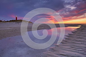 Lighthouse on Texel island in The Netherlands at sunset