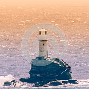 Lighthouse Tourlitis at Andros island in Greece.