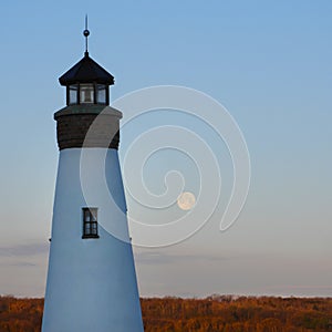 Lighthouse tower and Supermoon over Cayuga Lake
