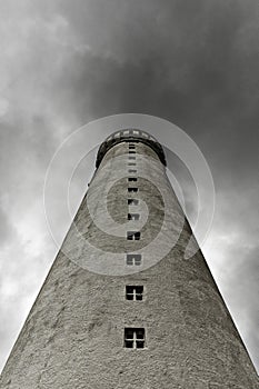 Lighthouse upwards gray sky