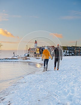 Lighthouse of Urk during winter with snow in the Netherlands