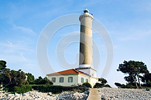 The lighthouse at Veli Rat, on the island Dugi Otok, Adriatic sea, Croatia, popular sailing destination, view from the pier