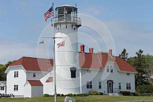 Lighthouse Waving American Flag