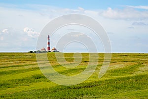 Lighthouse Westerhever in Schleswig Holstein, Germany. View on landscape by national park Wattermeer in Nordfriesland.