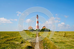 Lighthouse Westerhever in Schleswig Holstein, Germany. View on landscape by national park Wattermeer in Nordfriesland.