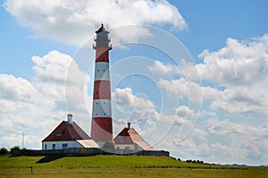 Lighthouse Westerhever in Schleswig Holstein, Germany. View on landscape by national park Wattermeer in Nordfriesland.