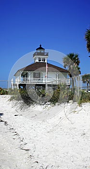 Lighthouse and white sand