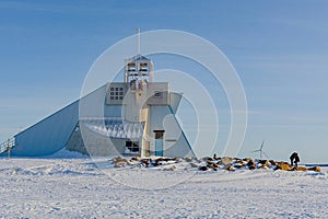 The lighthouse and the wind turbine