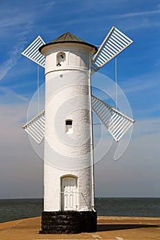 Lighthouse windmill in Swinoujscie, Poland photo