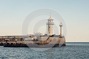 Lighthouse on Yalta embankment, Crimean resort on Black Sea