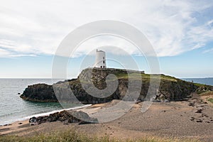 Lighthouse on Ynys Llanddwyn Island in Anglesey, North Wales photo