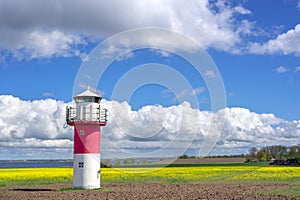 Lighthouses and a rapeseed field in south Sweden, Ven Island photo