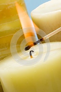Lighting candle with match