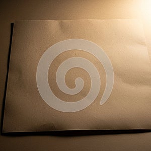 The lighting creates shadows, emphasizing the paper s texture