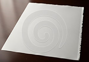 The lighting creates subtle shadows, emphasizing the paper's texture