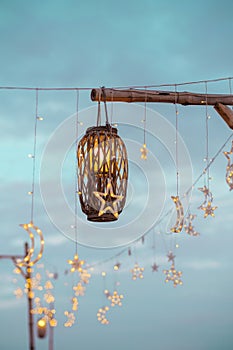 Lighting decor elements at a party. Lights lanterns and light garland background