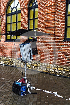Lighting equipment for lighting the facade of the brick house for filming photo