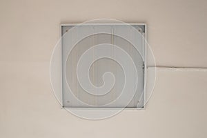 Lighting fixture hangs on the ceiling on a light