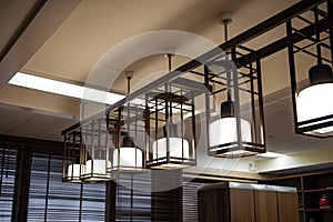 lighting fixture suspended from the ceiling, with dimmable led bulbs