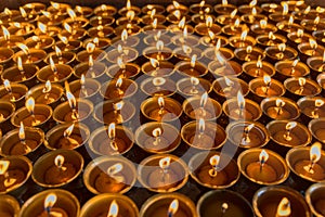 Lighting a lamp for peace from Shree Boudhanath Kathmandu ,Nepal.