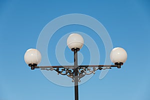 Lighting lamp on the stand, snow on the ceiling