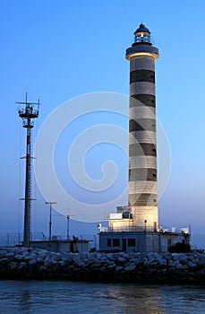 Lighting lighthouse in Lido di Jesolo, Italy photo