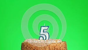 Lighting a number four birthday candle on a delicious cake, green screen 5