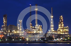 Lighting of oil refinery plant in heavy industry estate against