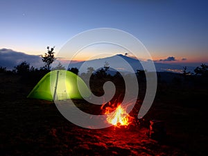 Lighting Tent, Campfire And Volcano Etna At Dawn, Sicily