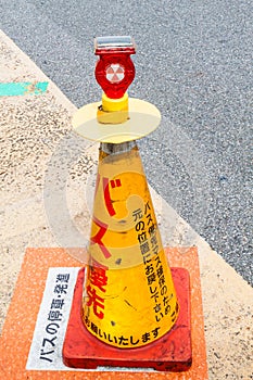 Lighting and traffic cone photo