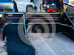 Lightl truck laying fresh bitumen