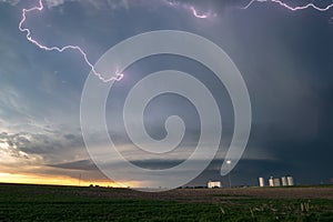 Lightning in the anvil of a supercell thunderstorm with an ufo mothership wallcloud