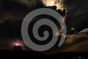 Lightning Behind the Mountain at night