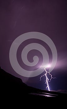 Lightning bolt in rural mountains