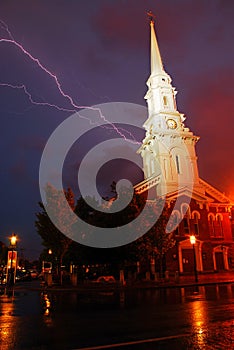 A lightning bolt strikes a historic church