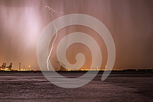 Lightning bolt strikes next to a nuclear power plant