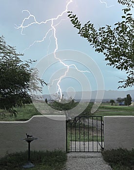 A Lightning Bolt Strikes Outside the Gate