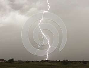 A Lightning Bolt Strikes a Rural Home