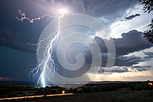 Lightning bolt during thunderstorm photo