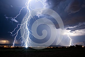 Lightning bolts striking at night photo