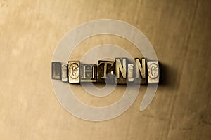 LIGHTNING - close-up of grungy vintage typeset word on metal backdrop