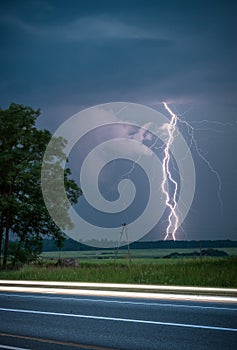 Lightning coming from rain storm cloud