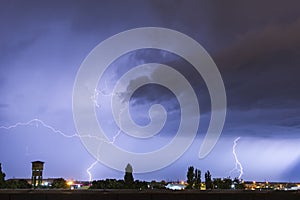 Lightning flash over a city lectricity blast storm