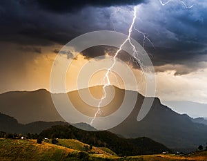 Lightning with moody clouds before thunderstorm