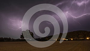 Lightning at night at Espejo, Alava, Spain photo