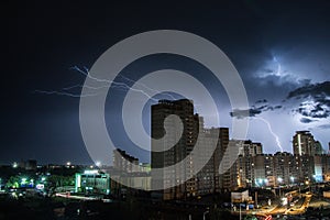 Lightning over the city at night