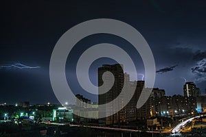 Lightning over the city at night